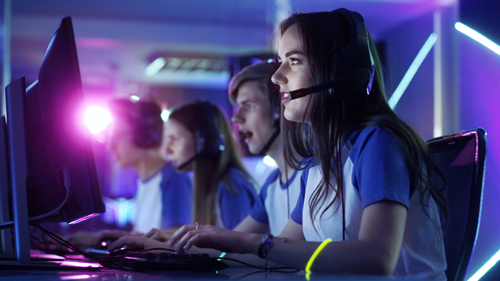 Beautiful Professional Gamer Girl and Her Team Participate in eS